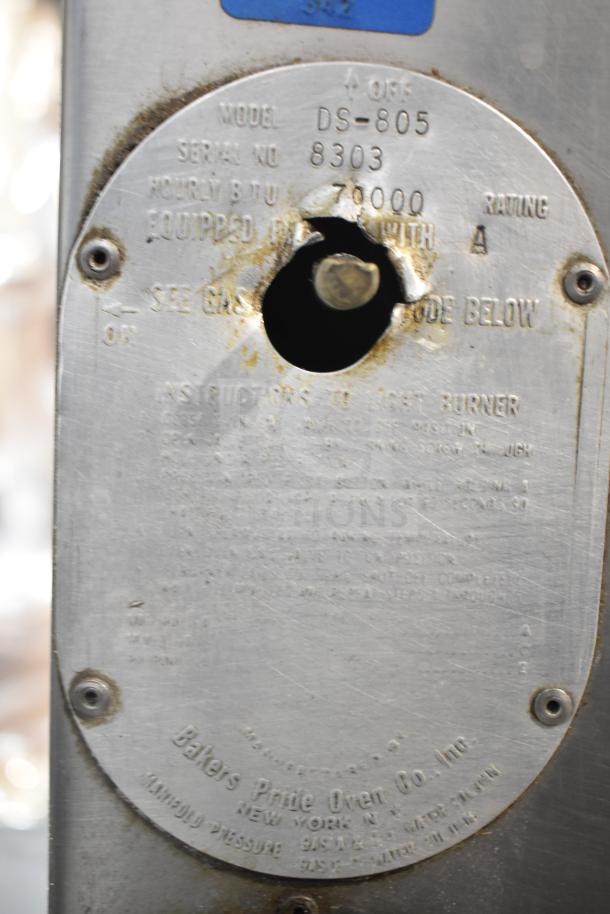 Bakers Pride DS-805 commercial pizza oven label showing model number and 70,000 BTU rating.