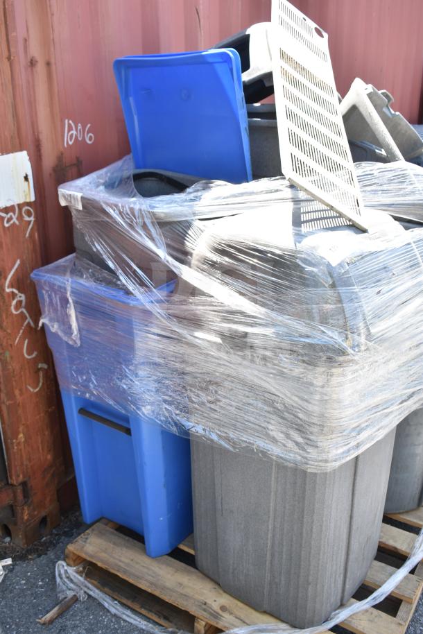 Eight gray poly trash cans, stacked and wrapped on a pallet, showing good condition and durability.
