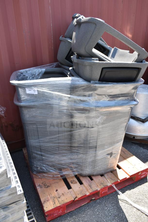 Set of 6 gray poly trash cans, stacked on a pallet, wrapped in plastic. New condition. Auction lot 141.