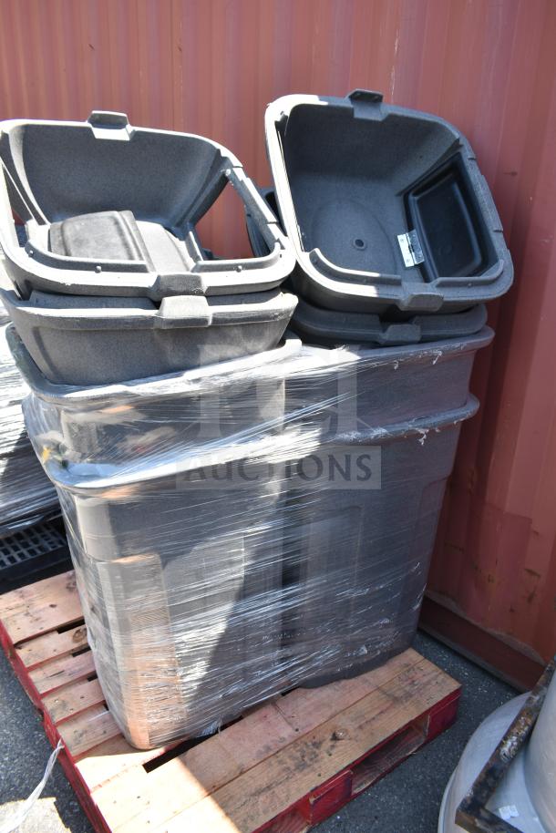 Six gray poly trash cans stacked, partially wrapped, on a wooden pallet. Auction offers 6 times the bid.