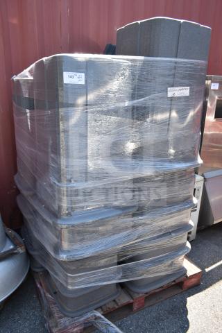 15 stacked gray poly trash cans on a pallet, wrapped in plastic. Tag indicates multiple items per bid. New condition.