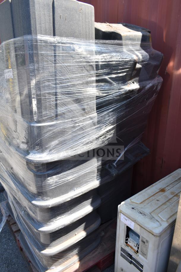 15 gray poly trash cans wrapped on a pallet, indicating bulk purchase. Some signs of use, ideal for commercial use.
