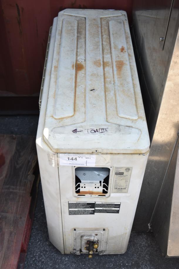 Lennox MPB018S4S-1P single zone heat pump, used condition with visible wear. Model label and auction tag attached.