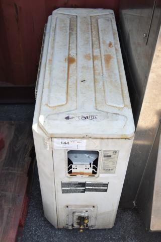 Lennox MPB018S4S-1P single zone heat pump, used condition with visible wear. Model label and auction tag attached.