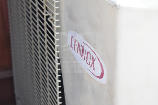 Lennox MPB018S4S-1P single zone heat pump, visible branding, side view showing metal grille, in good condition.