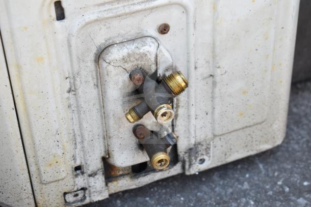 Lennox MPB018S4S-1P Single Zone Heat Pump, showing tarnished connectors and slight dirt on the casing.