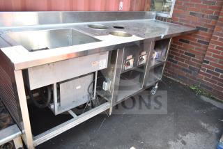 Commercial work station with Alto Shaam 200-CW cold pan drop-in, 2 round steam wells, on wheels, stainless steel finish.