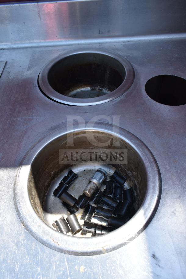 Commercial work station featuring Alto Shaam 200-CW cold pan drop-in and two round steam wells, stainless steel surface.