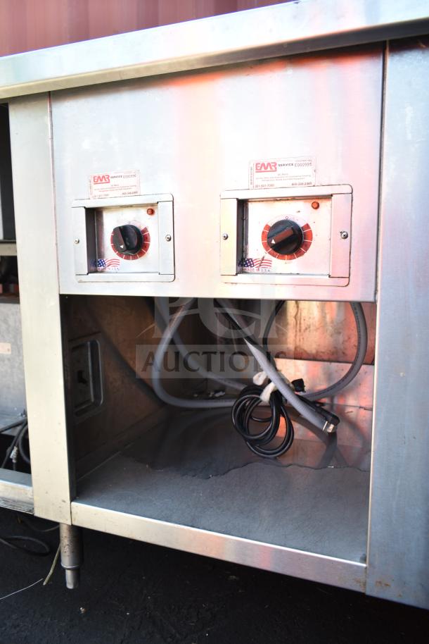 Commercial work station with Alto Shaam 200-CW cold pan drop in, featuring two round steam wells; shown with control knobs and wiring.