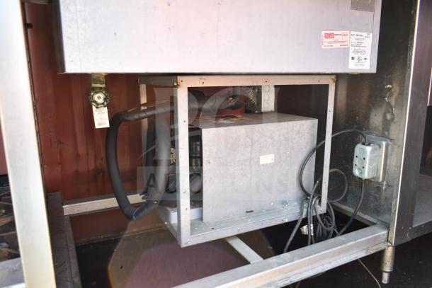 Commercial work station with Alto Shaam 200-CW cold pan, two steam wells, visible wiring, and metal construction.