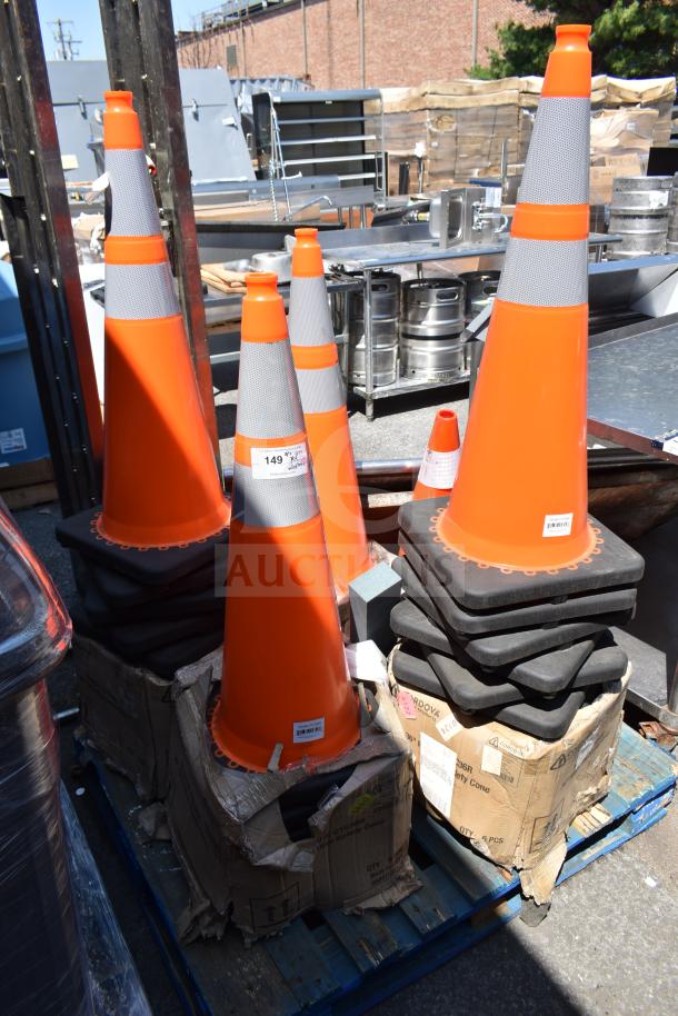 24 orange PVC reflective traffic safety cones, 36 inches tall, model CTC36R, in good condition with visible labels.