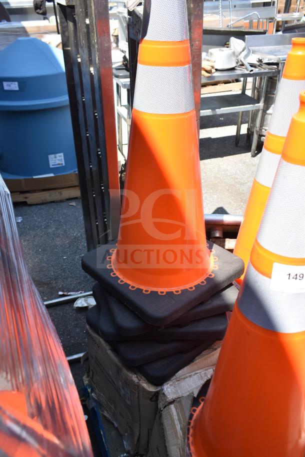 24 CTC36R 36 in. Orange PVC Reflective Traffic Safety Cones in good condition, stacked for auction.