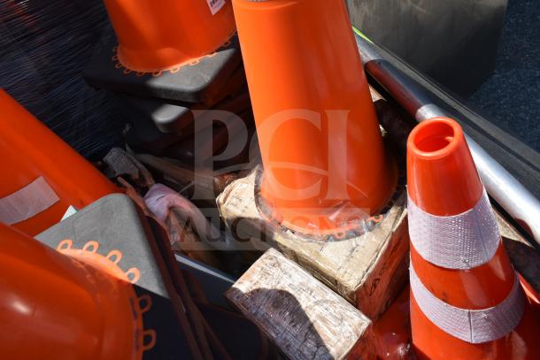 Orange CTC36R 36 in. PVC reflective traffic safety cones, stacked and ready for auction. Condition appears new.