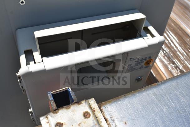 Capsa Solutions XL2097599 cart on commercial casters, features locking compartment, visible wear and tear, biohazard label shown.