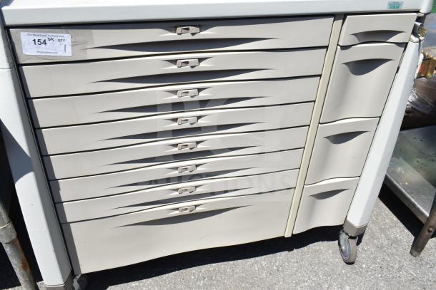 Capsa Solutions XL2097599 cart with multiple drawers, commercial casters, white, visible auction label.