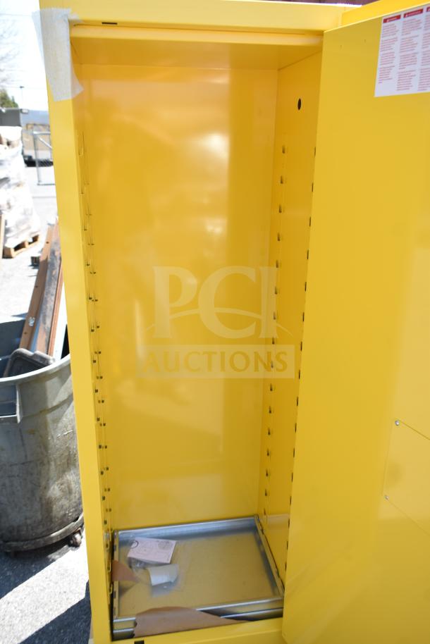 Brand new Eagle 24-gallon yellow flammable liquid safety cabinet, model 1923X, manual-closing door, shown open.