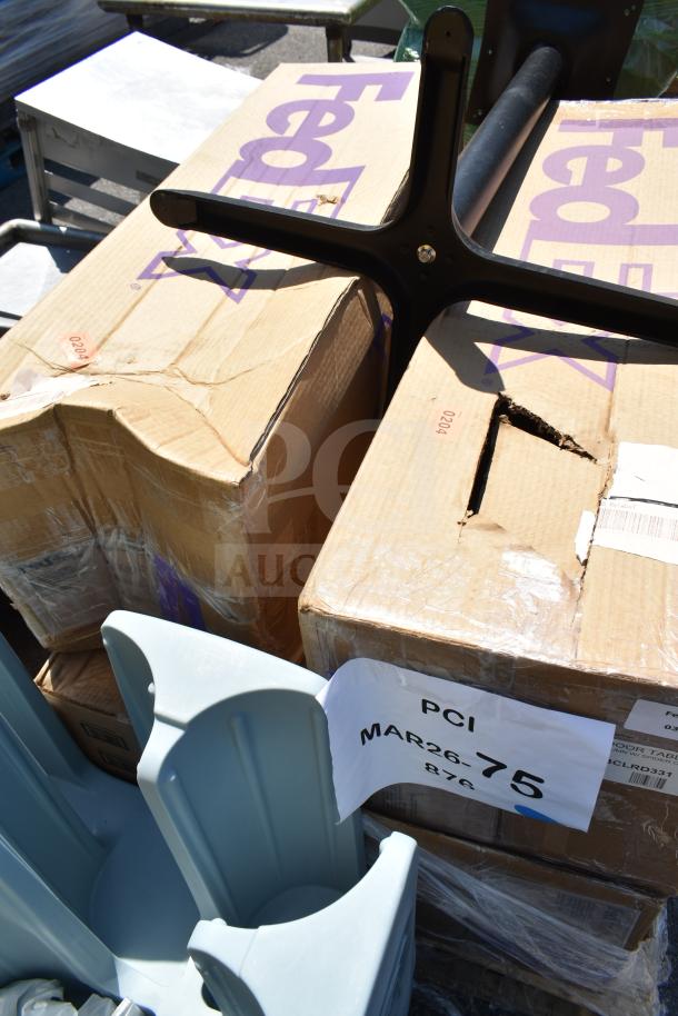 5 new outdoor table bases with scratches and dents. Includes labels with "PCI MAR26-75." Stored in FedEx boxes.