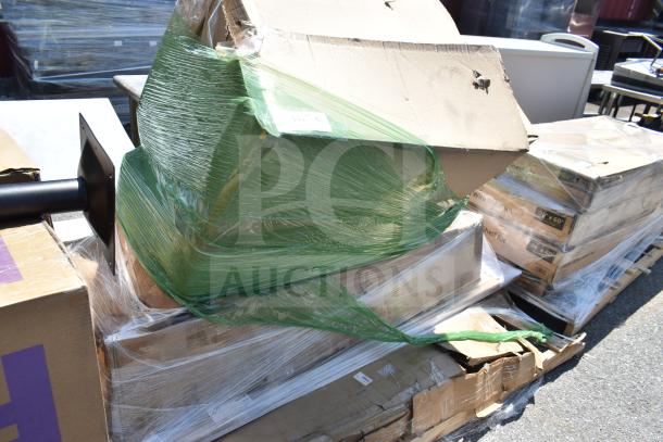 Stack of six brand new items, including a hand sink and café barstool, partially wrapped, showing visible packaging dents.