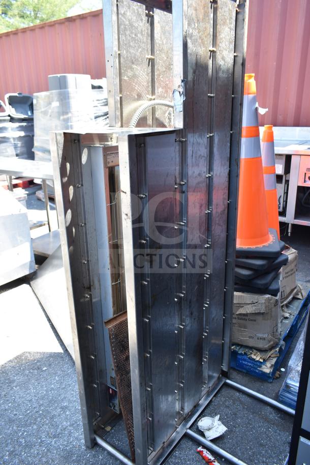 Stainless steel over shelf with Hatco Glo Ray food warming strip, used condition, visible power cord, for commercial use.