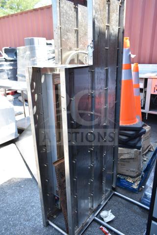 Stainless steel over shelf with Hatco Glo Ray food warming strip, used condition, visible power cord, for commercial use.