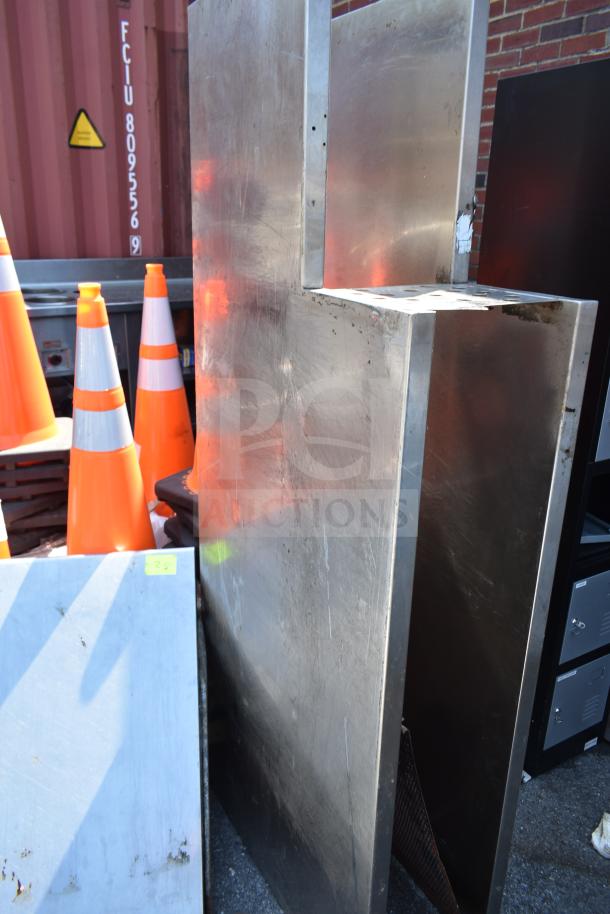 Metal over shelf with Hatco Glo Ray food warming strip, industrial condition, visible wear, large, robust structure.