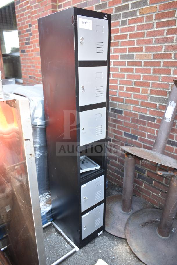 Fedmax gray and black 6 cubby locker with secure doors, slight wear visible. Top label indicates "169-17".