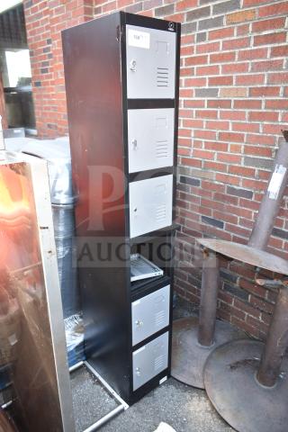 Fedmax gray and black 6 cubby locker with secure doors, slight wear visible. Top label indicates "169-17".