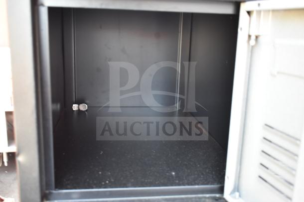 Fedmax Gray and Black 6 Cubby Locker, open compartment view, showing durable metal construction and lock system.