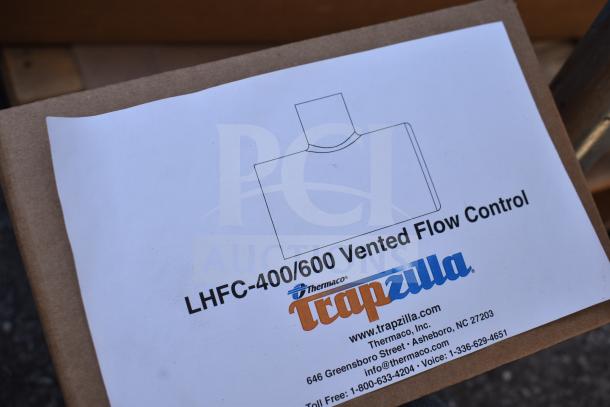 BRAND NEW Thermaco Trapzilla TZ-400-ECA grease interceptor, 405 lb, 75 GPM, 4" in/outlet, 18" extension collar.
