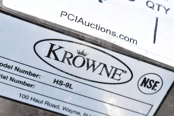 Krowne HS-9L wall-mounted hand sink label showing model number, NSF certification, and manufacturer's address.