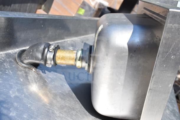 Krowne HS-9L 14 1/4" x 12" wall-mounted hand sink, stainless steel, visible plumbing fixtures, used condition.