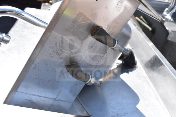 Krowne HS-9L wall-mounted hand sink, 14 1/4" x 12", stainless steel, visible plumbing connections, used condition.