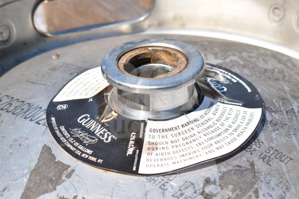 Steel half-size Guinness keg, durable, with visible label indicating 15.5-gallon capacity and 4.2% alcohol content.