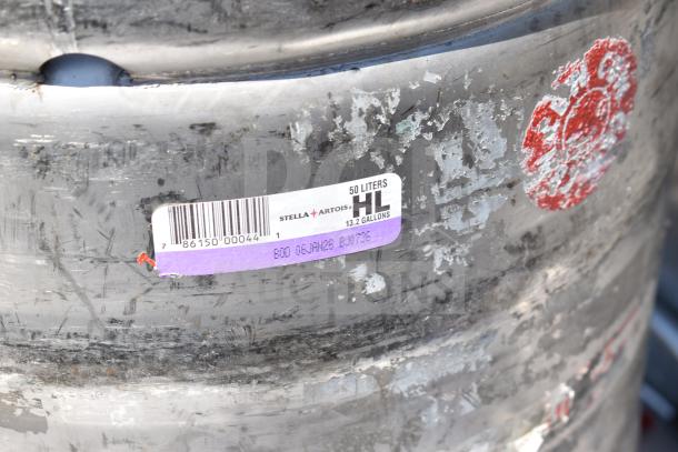 10 half-size barrel kegs with visible wear. Label: 50 liters, Stella Artois. Bids multiplied by 10.