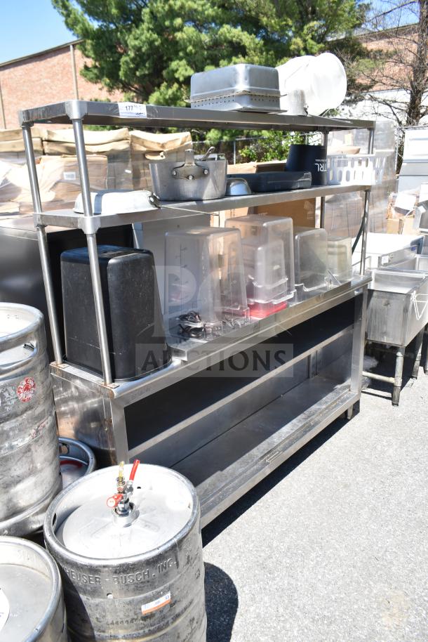 Stainless steel commercial table with two-tier over shelf and under shelf, includes various kitchen containers and pots.