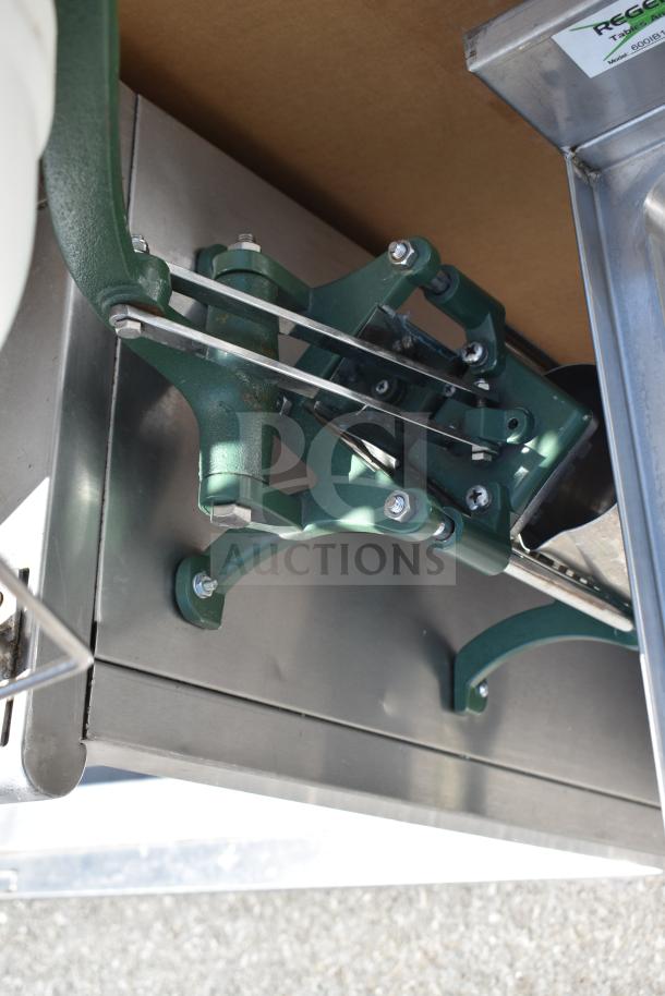 Commercial stainless steel table with two-tier overshelf and undershelf, includes contents. Adjustable fixtures and model label visible.