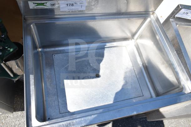 Regency 600IB1824CP Commercial Ice Bin with Cold Plate, stainless steel, NSF certified, visibly used condition.