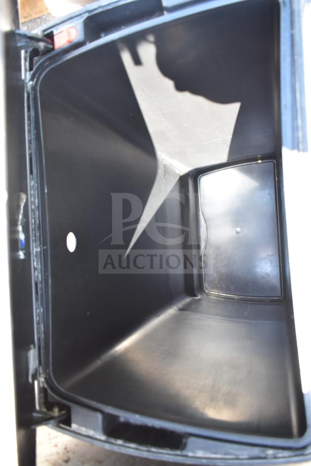 2 metal foot pedal trash can, open view showing interior. Features durable black metal construction, excellent condition.