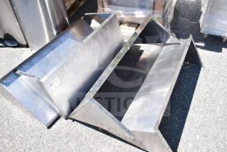 Stainless steel wall mount shelves, set of four, includes tag marked "184", in good used condition.