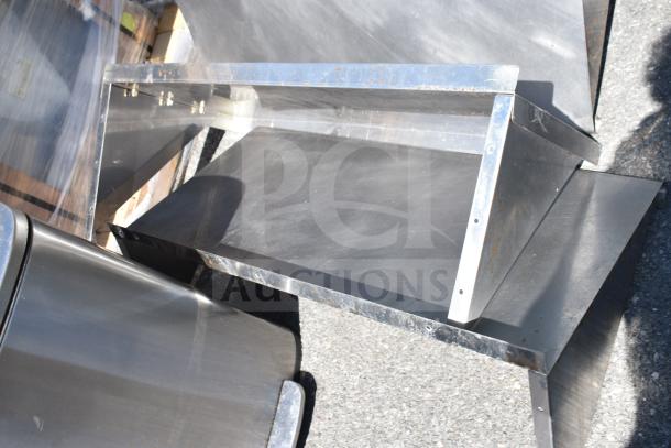 Stainless steel wall mount shelf, sturdy construction, slight wear, ideal for storage. Multiple units available.