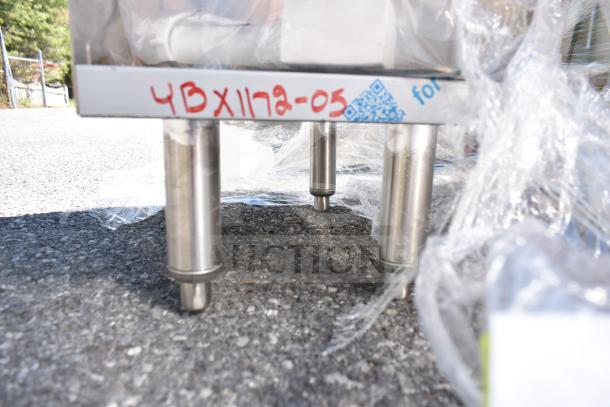 BRAND NEW SCRATCH AND DENT! Eagle Group FBGR12-18, 12" glass rack storage unit with flatboard top, tags visible.