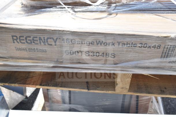 Regency 16 Gauge Work Table, 30x48 model 600TS3048S, brand new, wrapped in plastic. Includes ice bin, wire shelves.
