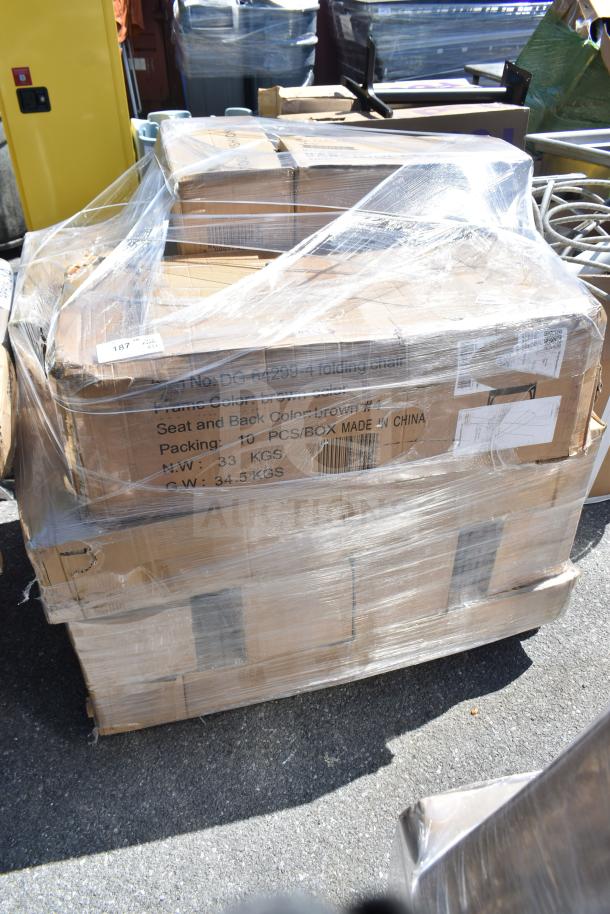 Plastic-wrapped pallet of brand new scratch and dent items, including boxes labeled with chair details. Visible tags indicate contents and weight.