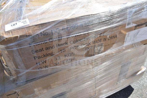 Pallet of new scratch and dent items, including cushions and chair, wrapped in plastic. Box label indicates "Made in China".