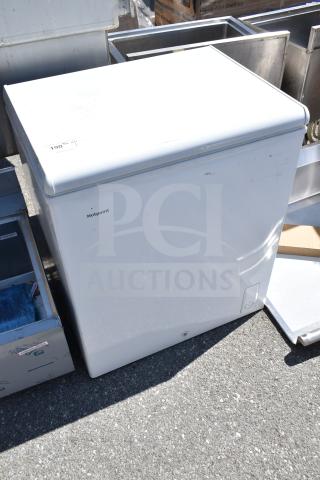 Hotpoint HHM5SMWW chest freezer, white, 115 volts, 1 phase. Visible markings, minor wear. Ideal for home or commercial use.