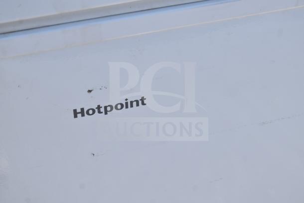 Hotpoint HHM5SMWW chest freezer exterior with logo, showing minor wear. 115 Volts, 1 Phase.