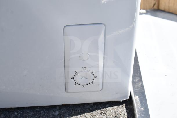 Hotpoint HHM5SMWW chest freezer, control dial visible, 115 volts, 1 phase, white finish, excellent condition.