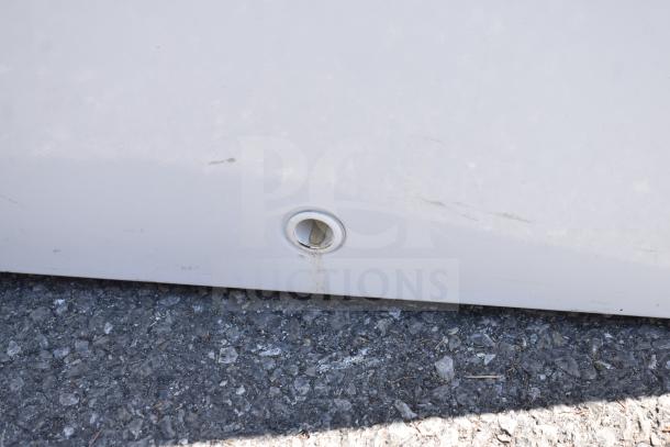 Hotpoint HHM5SMWW chest freezer, visible drain plug, white exterior, minor surface scratches, 115 volts, 1 phase.