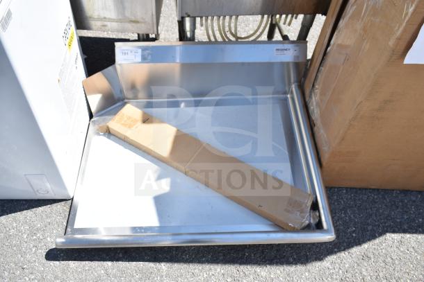 "Regency 600CDT36R 16 gauge 3' clean dish table with right drainboard, scratch and dent condition, visible label."