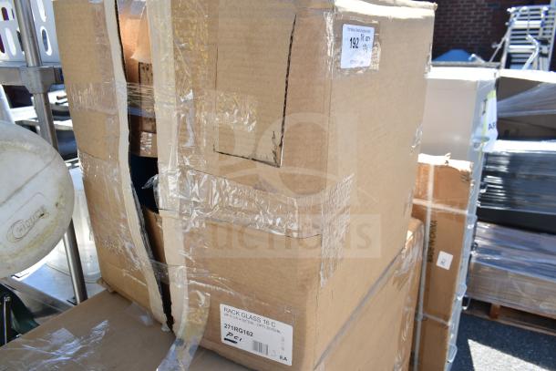 Cardboard boxes labeled "RACK GLASS 16 C" and "Made in China," sealed with tape, contain new scratch and dent items.